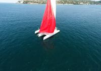 trimaran sailing yacht red gennaker sail neel 45